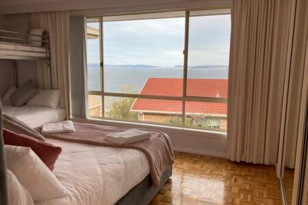 Seaside Serenity: Panoramic Waterfront Retreat