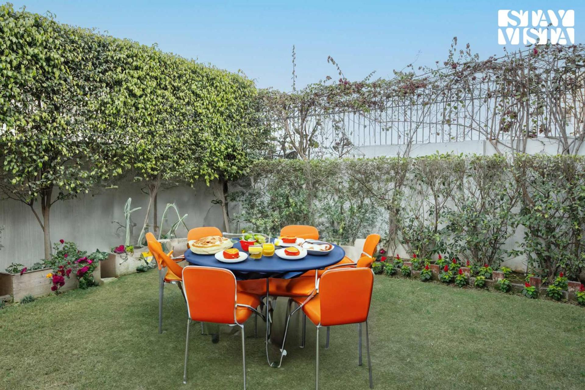 StayVista's Velvet Whisper - Urban Retreat with Contemporary Decor, Cozy Balcony & Lawn view 3