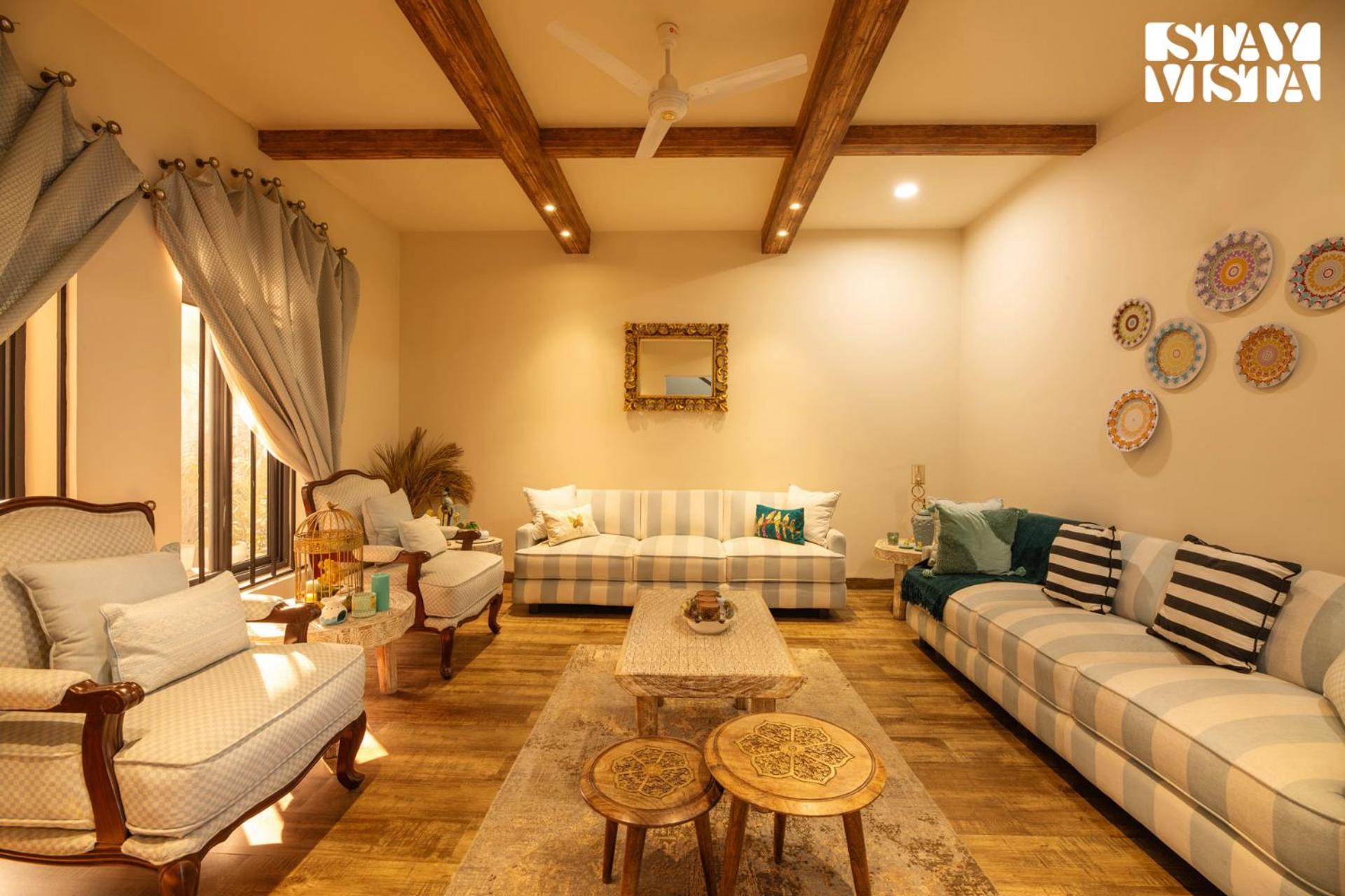 StayVista's Velvet Whisper - Urban Retreat with Contemporary Decor, Cozy Balcony & Lawn view 2