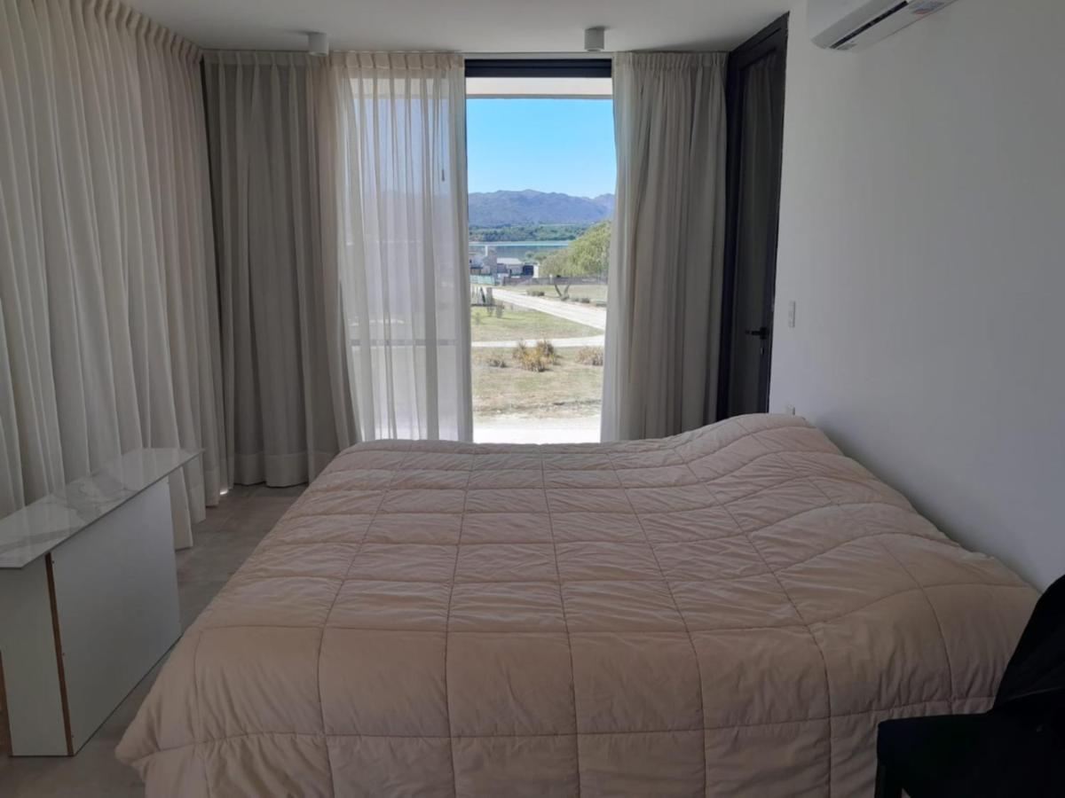 Hermosa casa en Puerto del Águila, a orillas del Dique Los Molinos