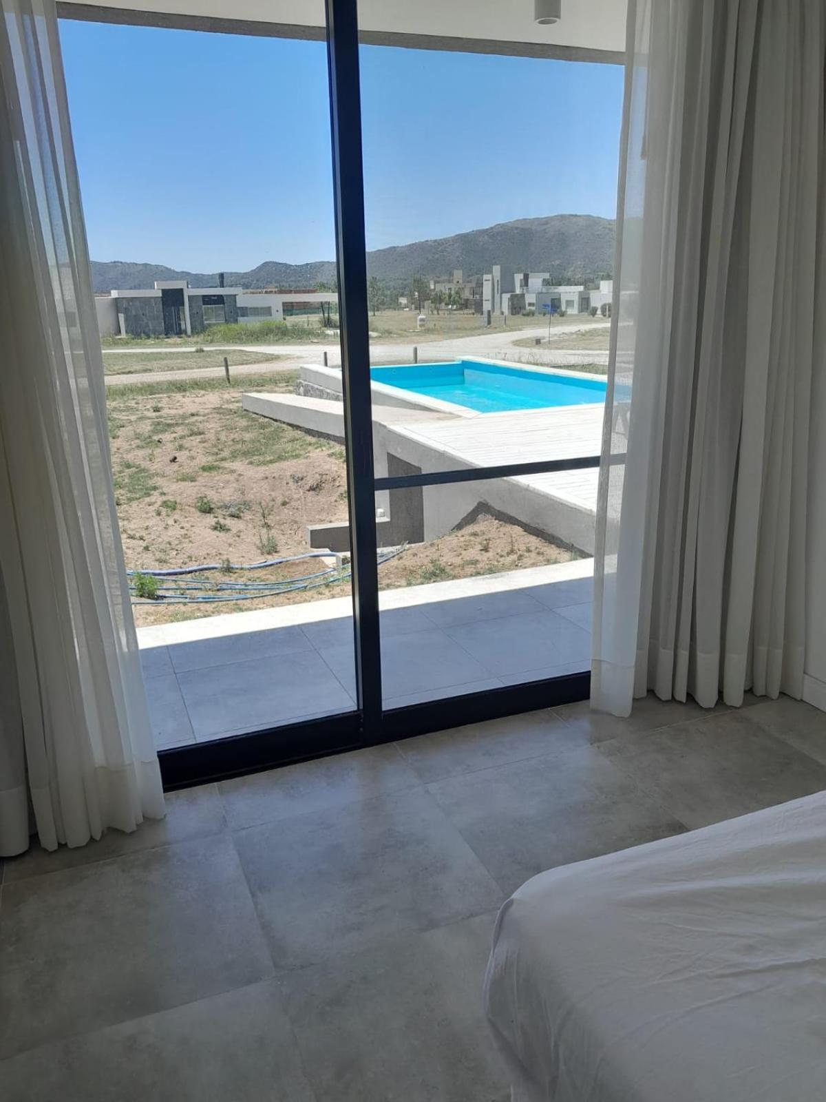 Hermosa casa en Puerto del Águila, a orillas del Dique Los Molinos