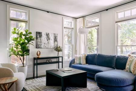 Chic 4BR with Fenced Yard Walk to Dining Parking 5 Mins to Nissan Stadium Less than 2 miles to Broadway Workspace Parking 24 Hr Hospitality Great for Famil view 4