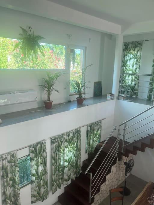 Whispering Clouds Beach House