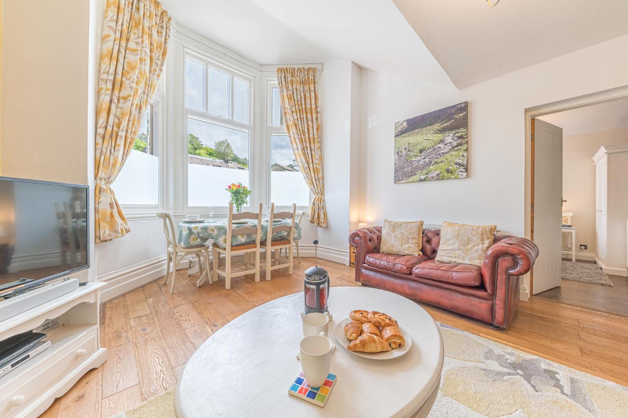 Enjoy relaxing family breaks in this central Ambleside apartment with parking view 3