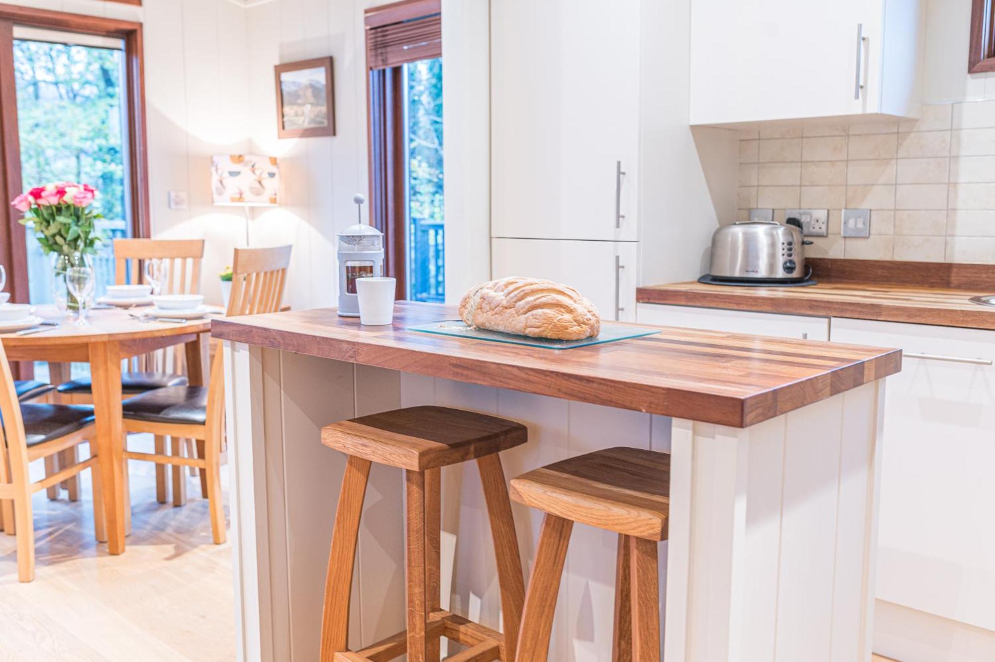 Family friendly, lovely Lakeland lodge with private parking and a patio