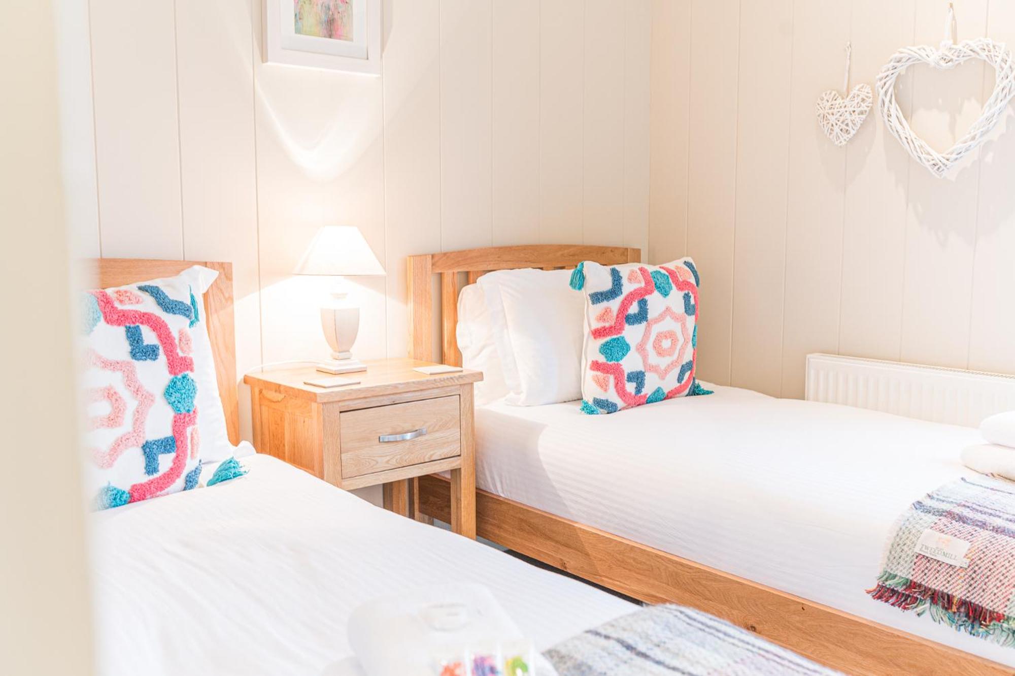 Family friendly, lovely Lakeland lodge with private parking and a patio