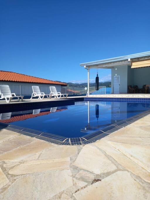 Chácara Aloés - piscina climatizada, suíte com ar cond banheira hidromassagem