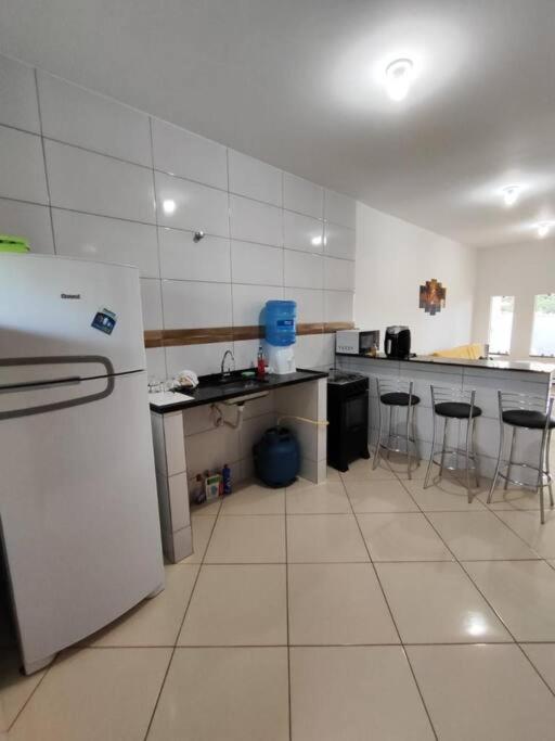 O paraiso existe casa lado praia