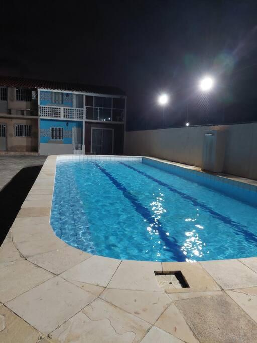 Casa na Praia com Super Piscina, em Condomínio Fechado.