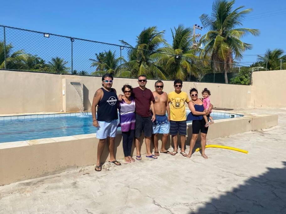 Casa na Praia com Super Piscina, em Condomínio Fechado.