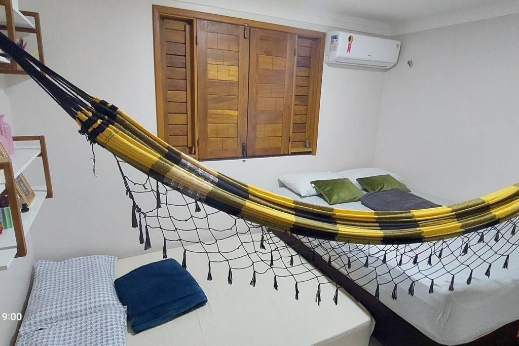 Casa na Praia com Super Piscina, em Condomínio Fechado.