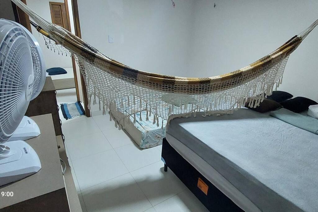 Casa na Praia com Super Piscina, em Condomínio Fechado.