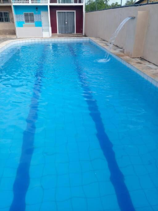Casa na Praia com Super Piscina, em Condomínio Fechado.