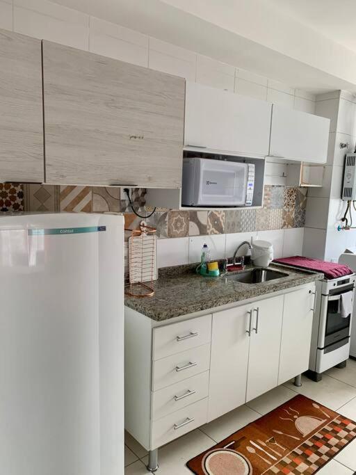Apartamento Enseada Villa Di Fiori com piscina