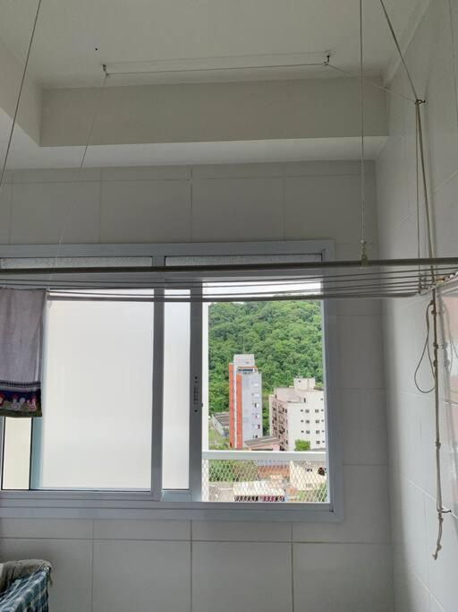 Apartamento Enseada Villa Di Fiori com piscina