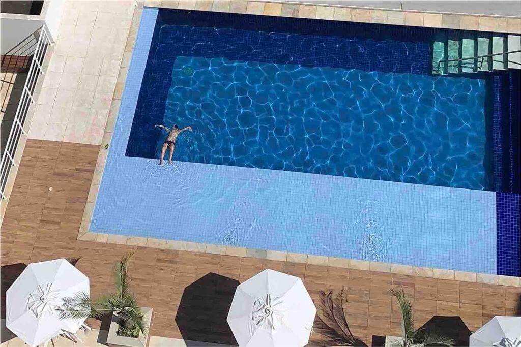 Apartamento Enseada Villa Di Fiori com piscina
