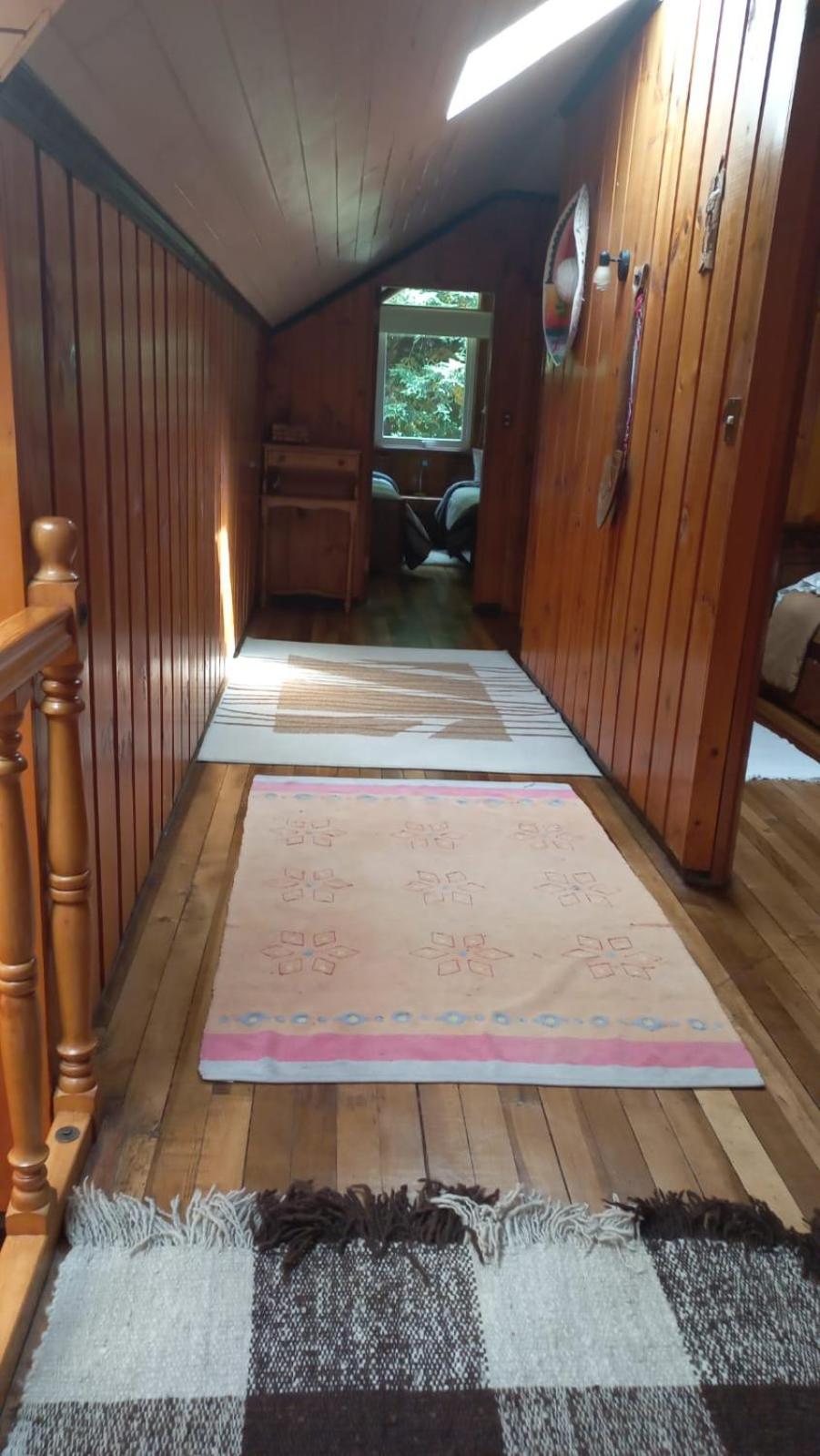 Cabañas y Hostal Casa de Campo Rukaleufu a orillas del Rio Huiscapi