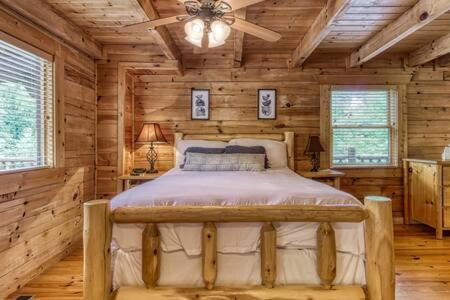 Cozy Forest Cabin - Hot Tub, Pets Welcome, Sleep 10 with Wraparound Deck, Scenic Views and Access to Resort Pool, Near The Parkway, Tanger Outlets and Doll view 3