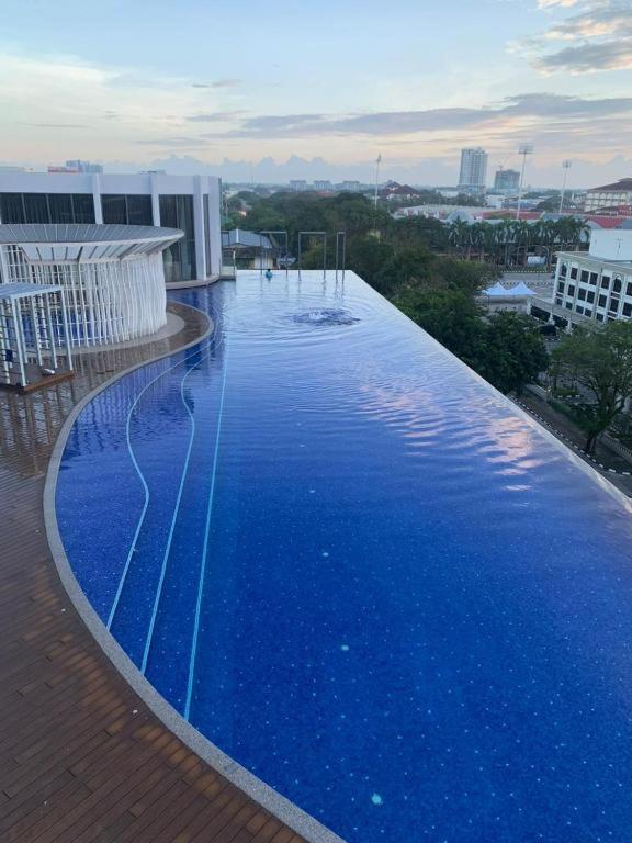 SINA TROIKA RESIDENCE KOTA BHARU 2BR WiFi NETFLIX POOL photo 5