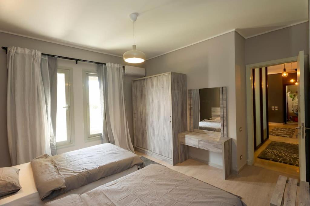 Wide Garden View 2BR New Cairo