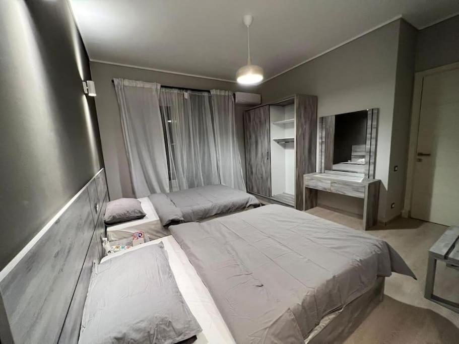 Wide Garden View 2BR New Cairo