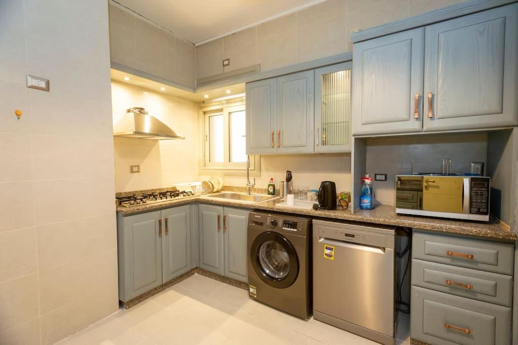 Wide Garden View 2BR New Cairo