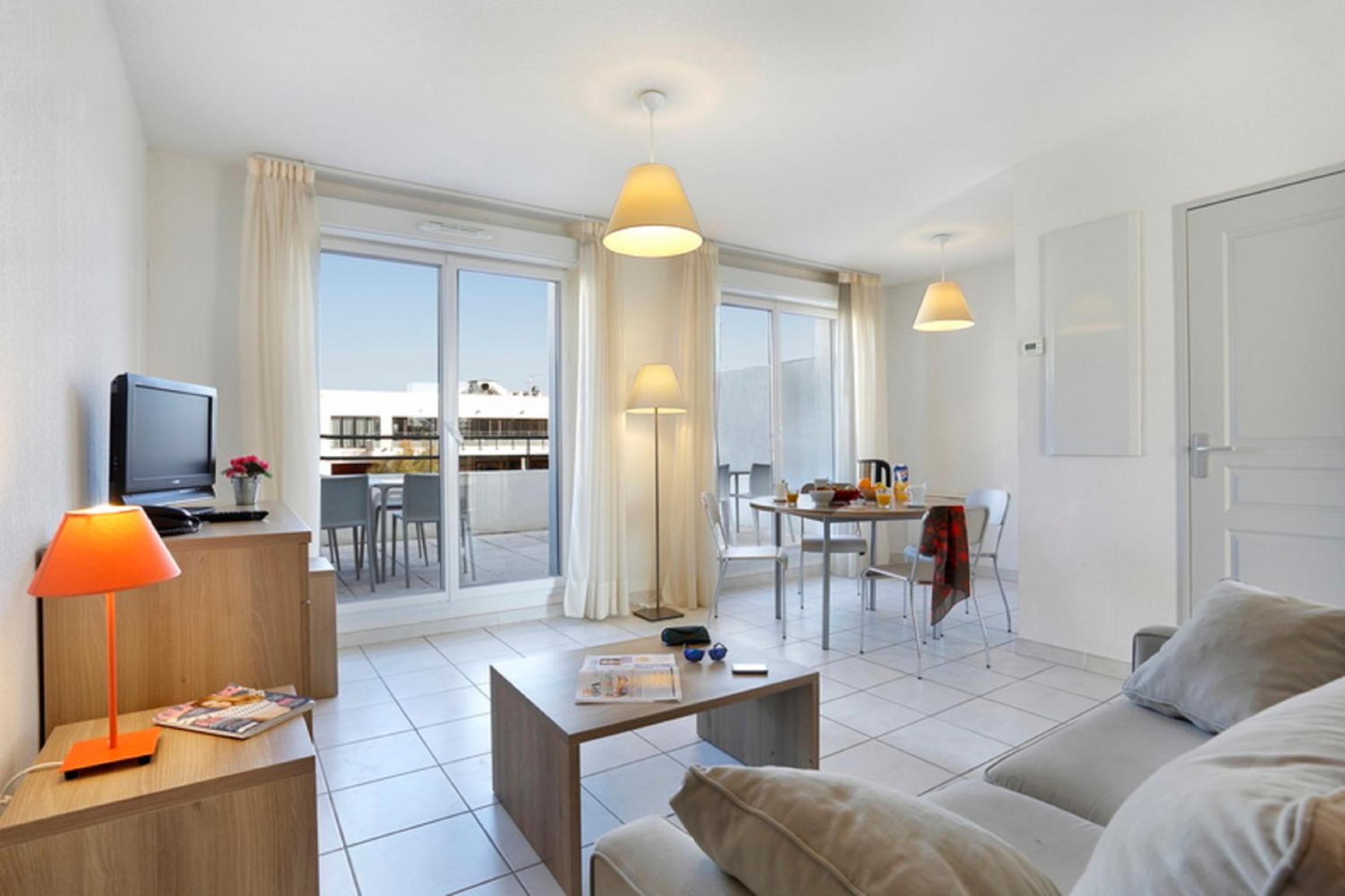 Vacancéole - Résidence Cap Camargue en Le Grau-du-Roi — hotel room