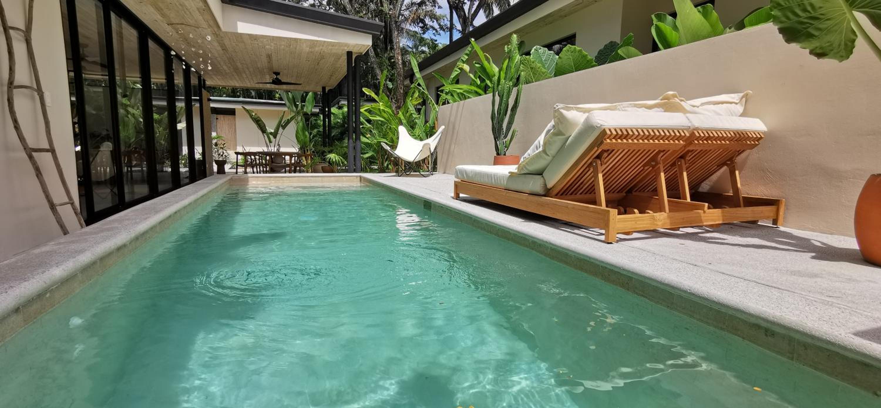 Casa Remy - Walk to the Beach and stay in a private compound! Pool, Kitchen, AC, Wi-Fi