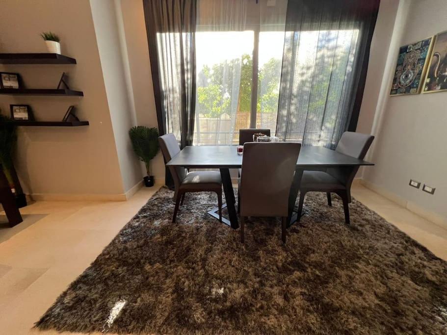 Lovely 2BR Apartment with Garden and Barbecue Area