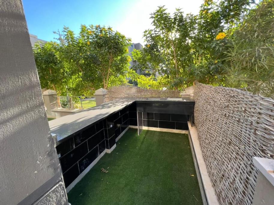 Lovely 2BR Apartment with Garden and Barbecue Area
