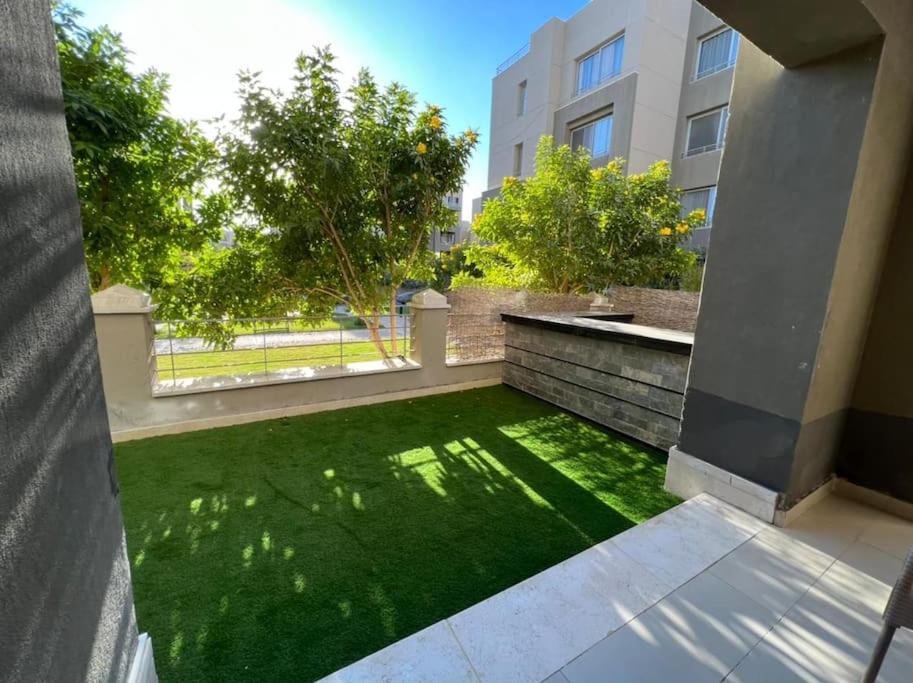 Lovely 2BR Apartment with Garden and Barbecue Area