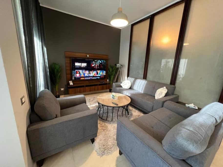 Lovely 2BR Apartment with Garden and Barbecue Area