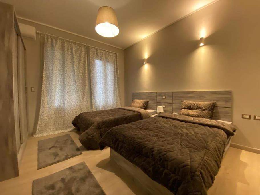 Lovely 2BR Apartment with Garden and Barbecue Area