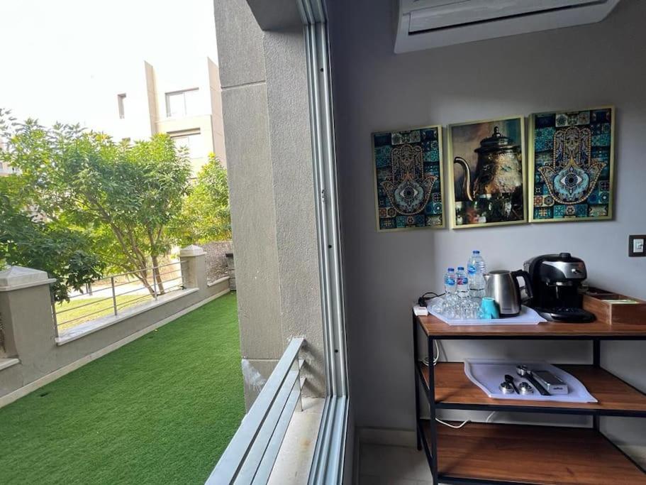 Lovely 2BR Apartment with Garden and Barbecue Area
