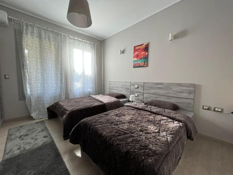 Lovely 2BR Apartment with Garden and Barbecue Area