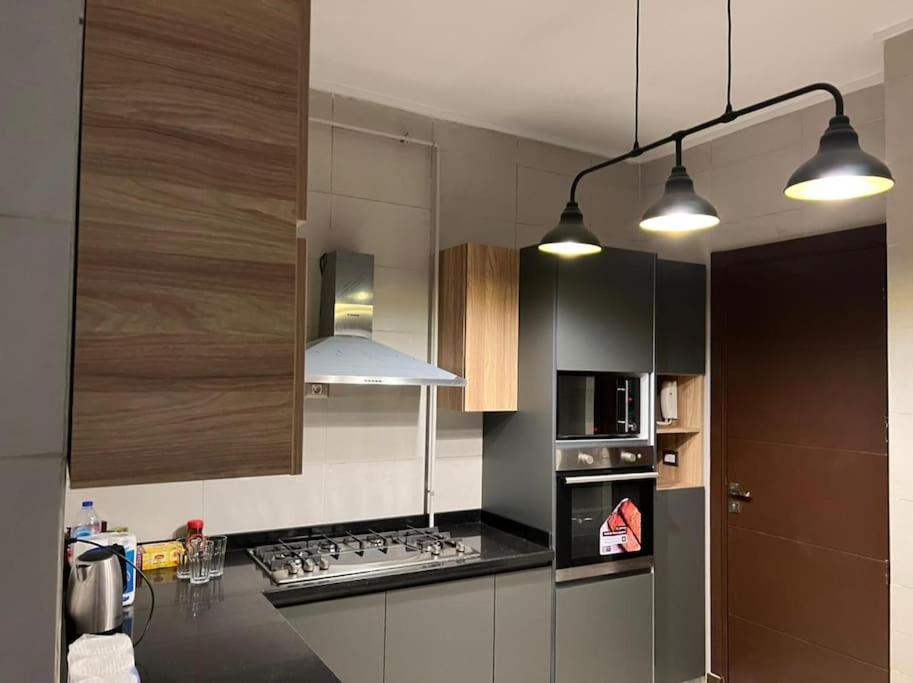 Lovely 2BR Apartment with Garden and Barbecue Area