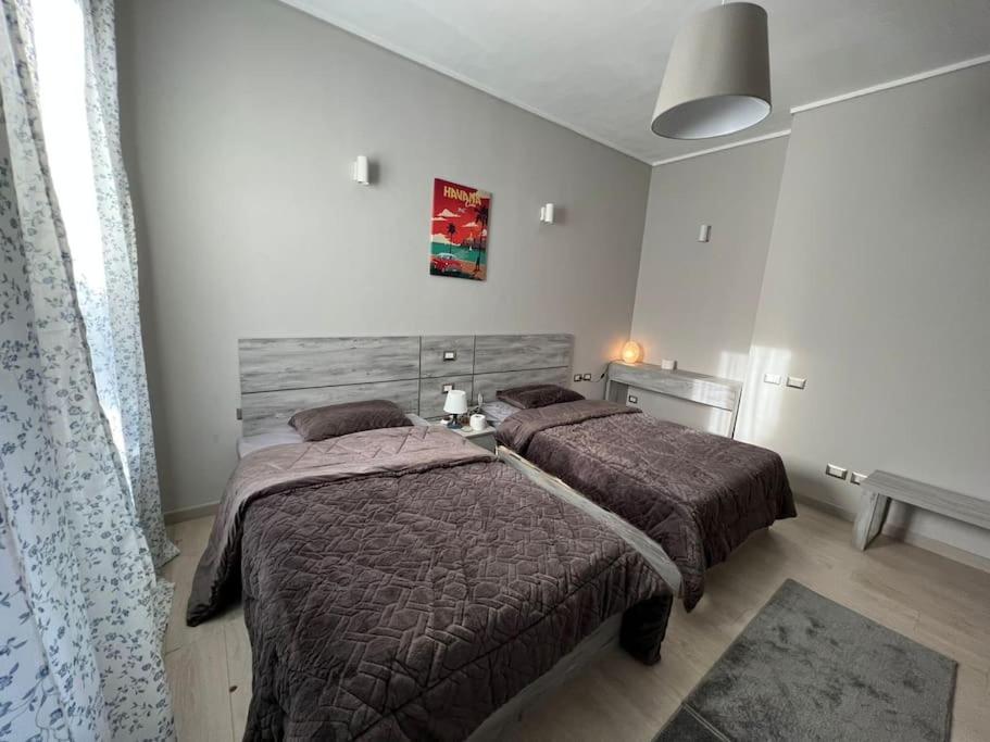 Lovely 2BR Apartment with Garden and Barbecue Area