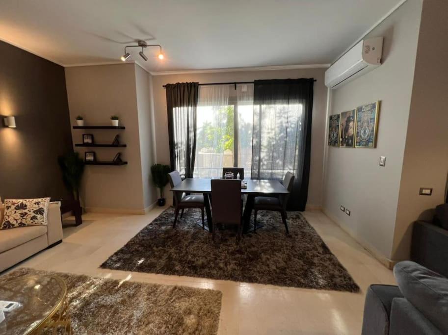 Lovely 2BR Apartment with Garden and Barbecue Area