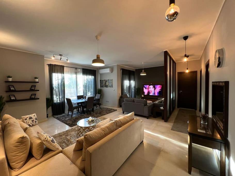 Lovely 2BR Apartment with Garden and Barbecue Area