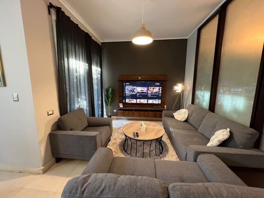 Lovely 2BR Apartment with Garden and Barbecue Area