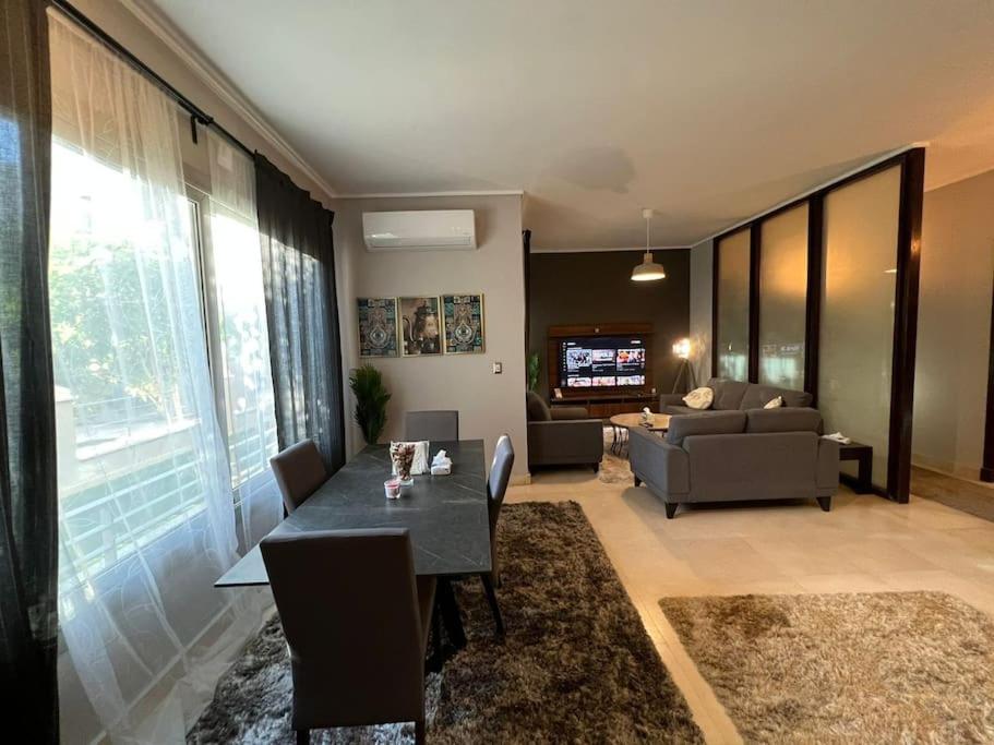 Lovely 2BR Apartment with Garden and Barbecue Area