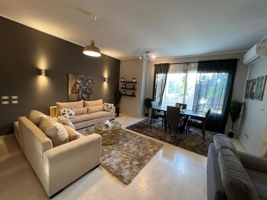 Lovely 2BR Apartment with Garden and Barbecue Area