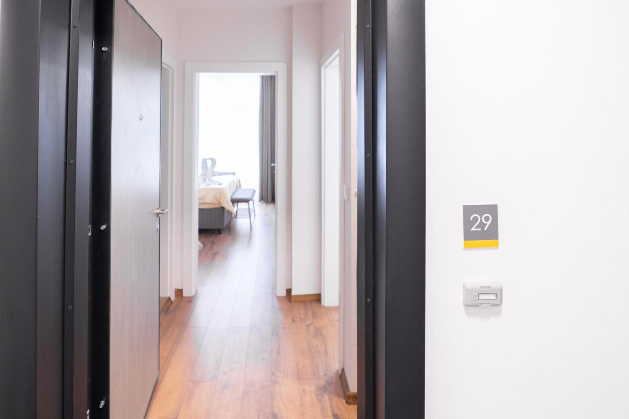 New Modern & Cozy apartment with FREE Private parking and EV charging station