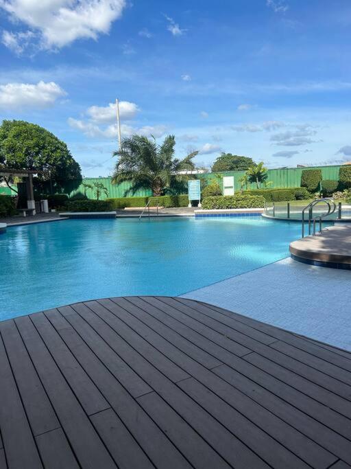 Modern Oasis: Pool + Netflix view 3