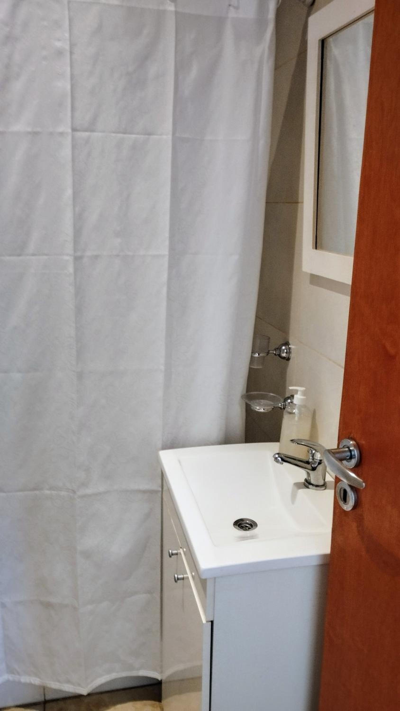 Golondrinas Suites, depto céntrico con ascensor y cochera