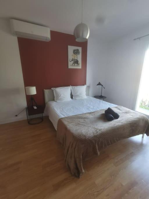Millerand maison climatisation 3 chambres jardin et stationnement proche intra muros