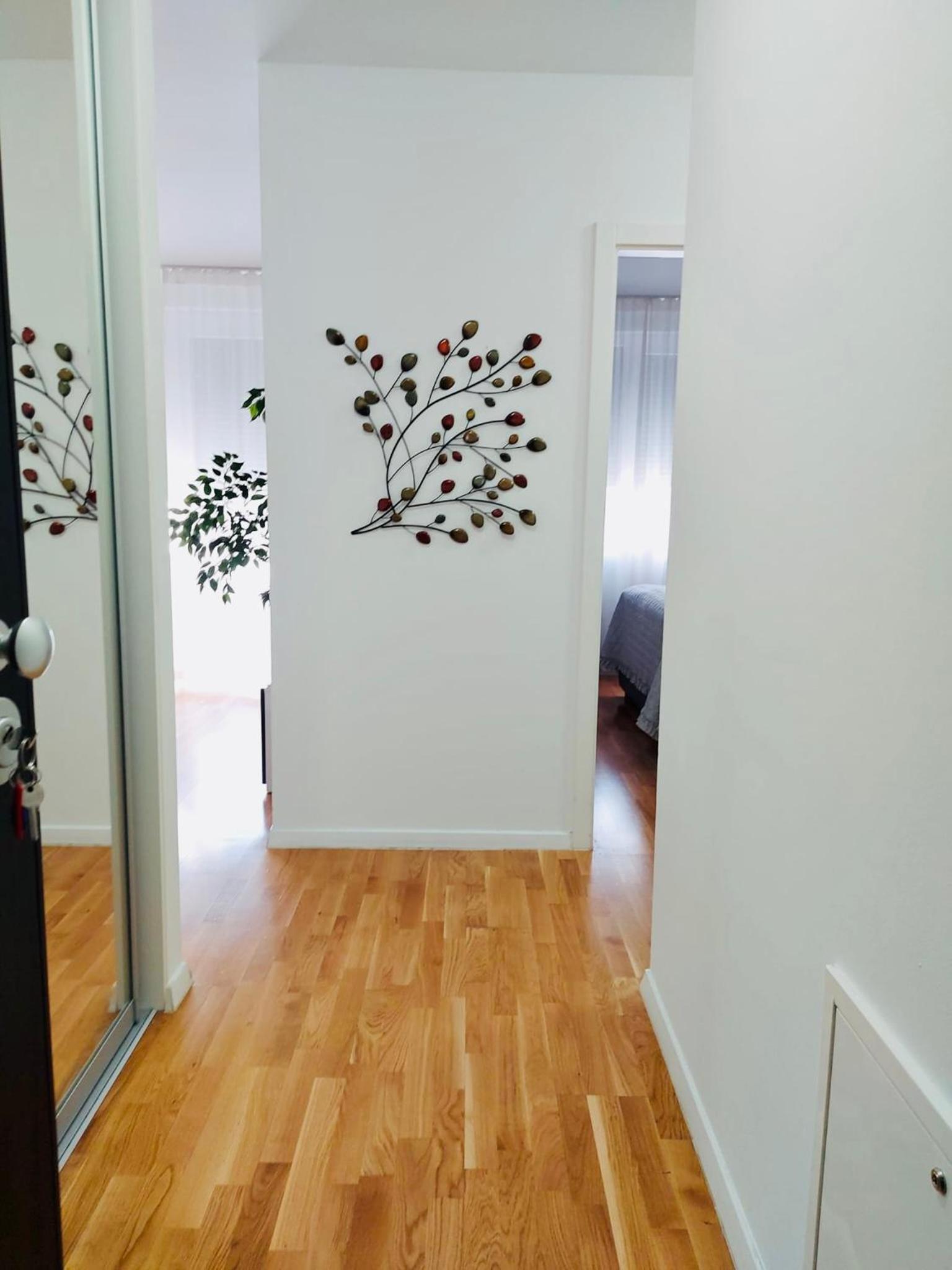 West Residence Luxury Apartment- parking in garage view 2