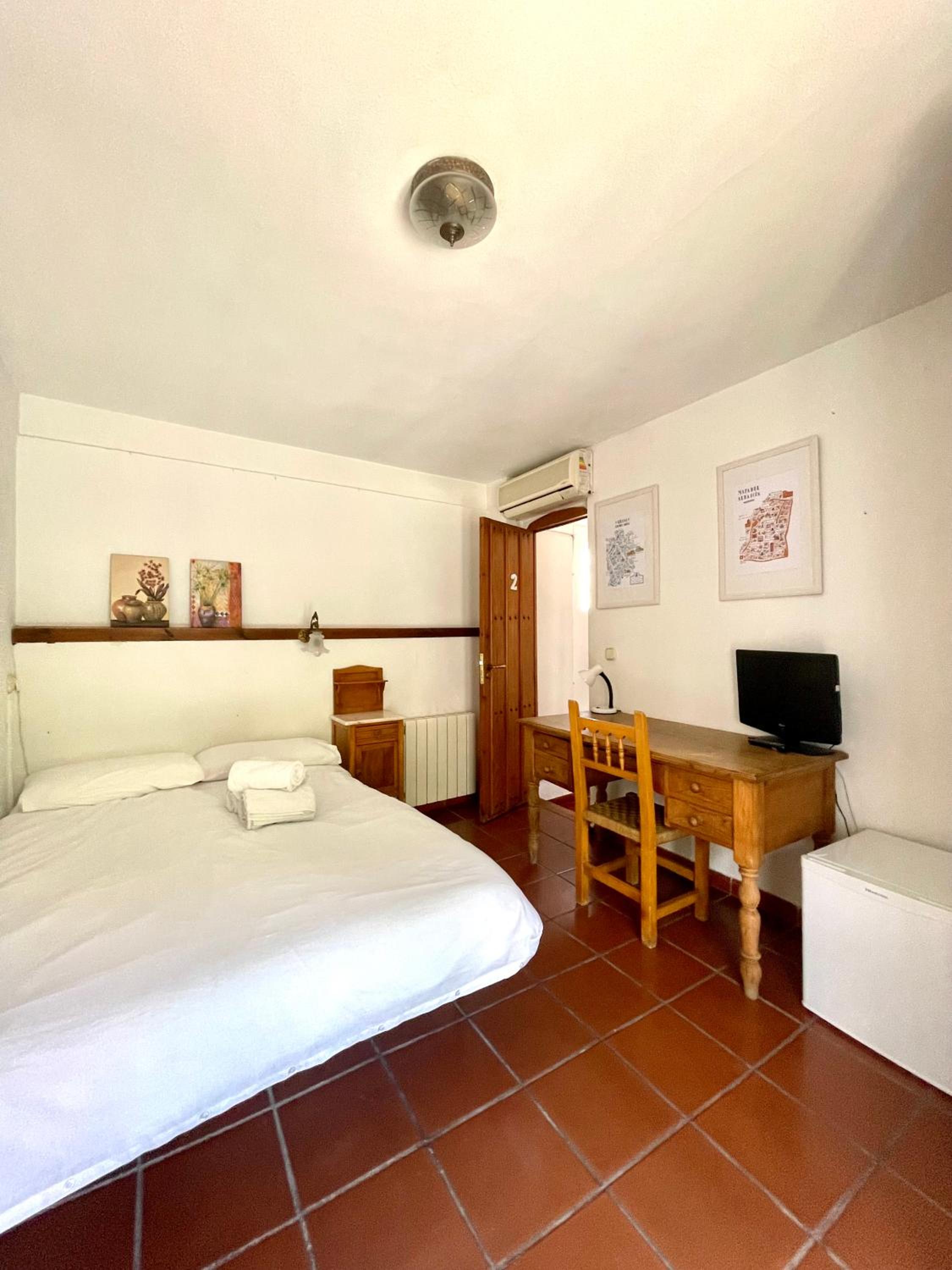 Habitación cama de matrimonio con baño privado