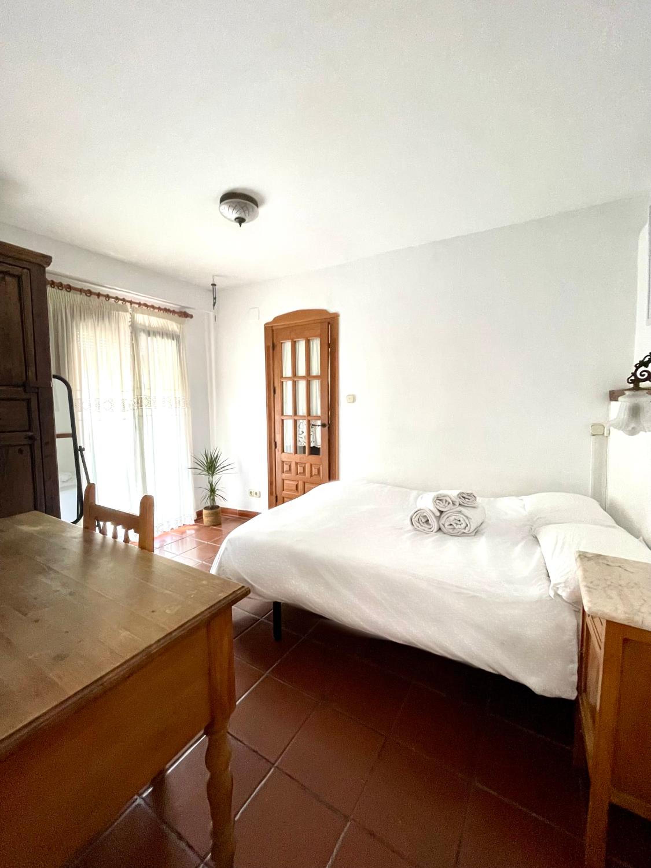 Habitación cama de matrimonio con baño privado