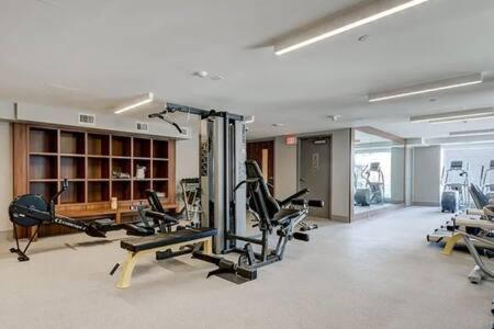 BOOK NOW, SAVE 30 PERCENT! Guest Favorite! Riverside Downtown w Walking Trails, FREE Wine, Parking, Banff Pass & Gym!